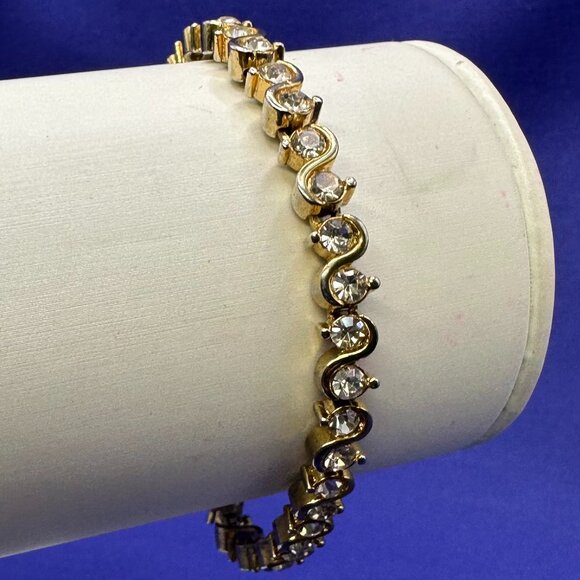 Tennis Bracelet.  Clear Crystals on Gold-Tone Chain. - Picture 1 of 12